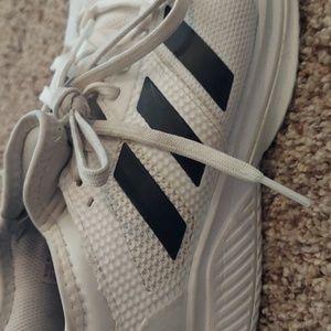 Women's 8.5 Adidas tennis shoes. White with black stripes.